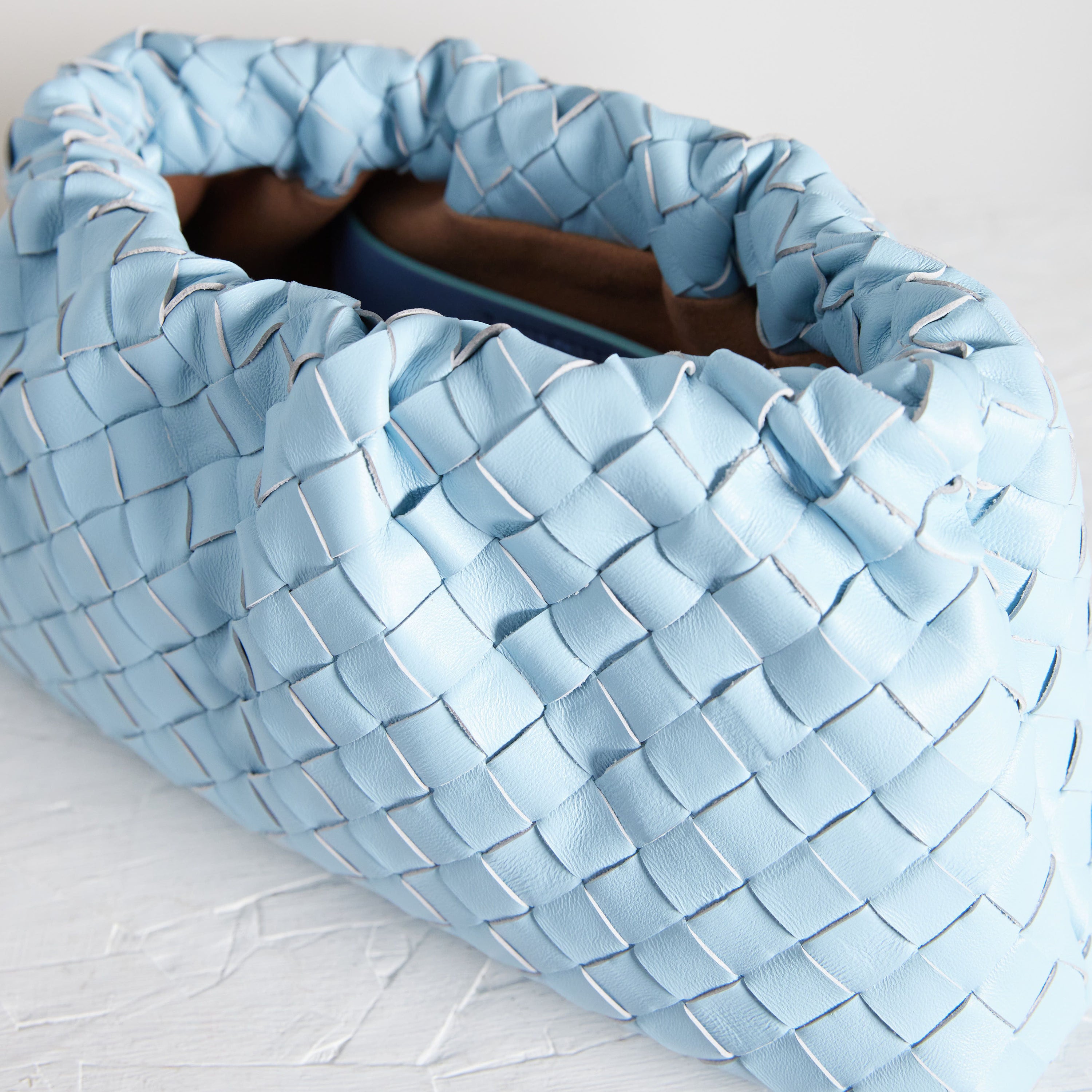 Roll 20 Interknit Sky Blue Clutch