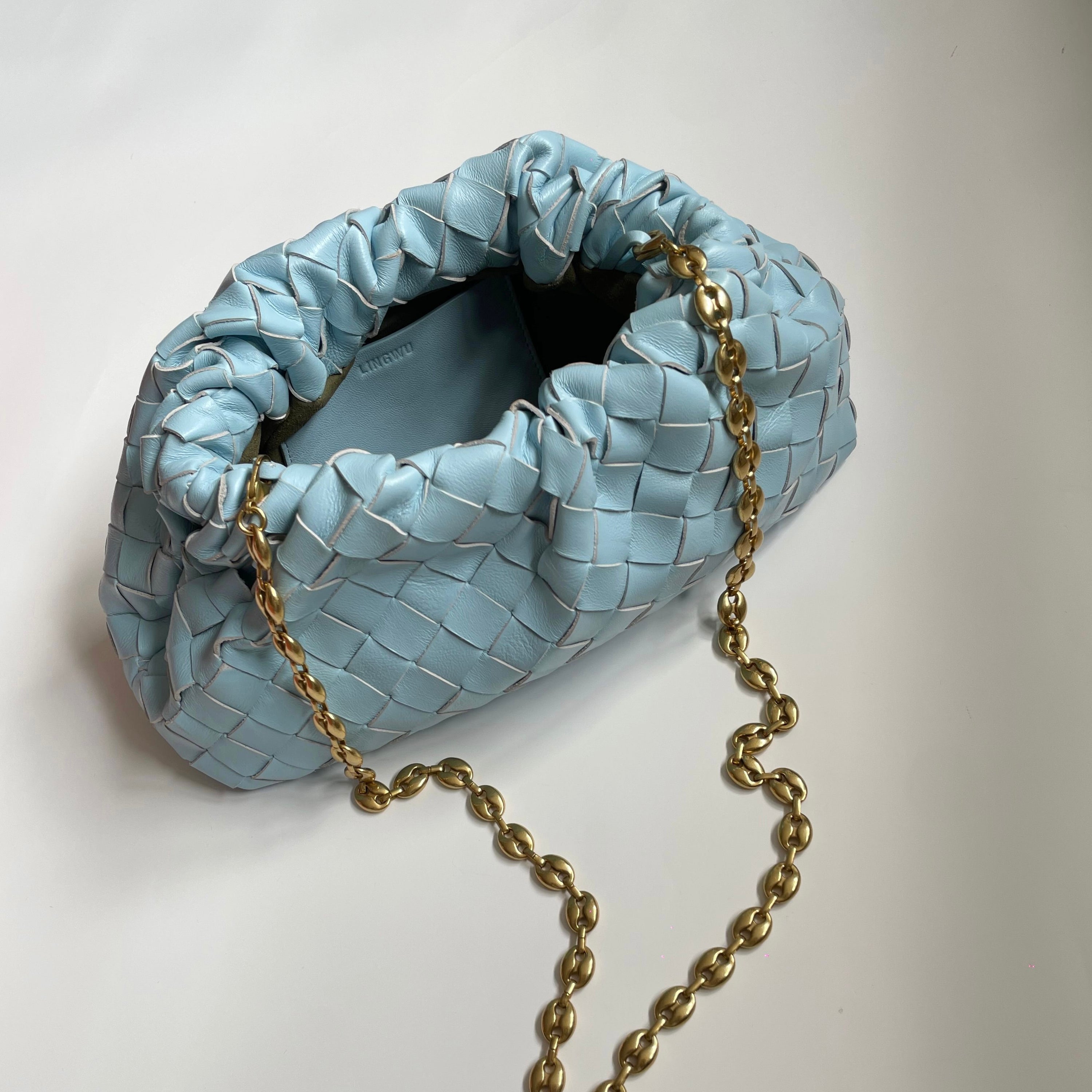 Roll 20 Interknit Sky Blue Clutch