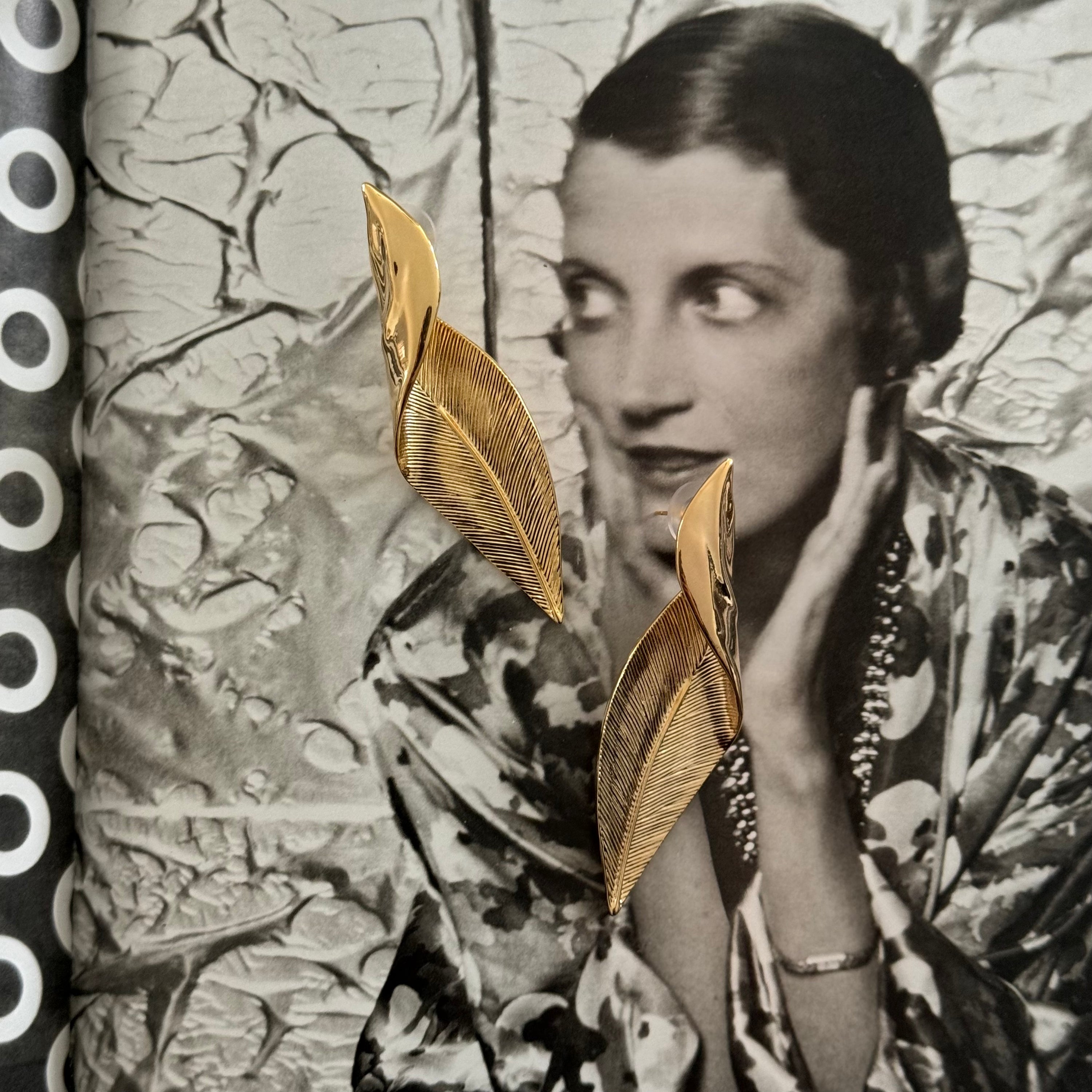 Long Gold toned Leaf Shaped Textured Pierced Earrings