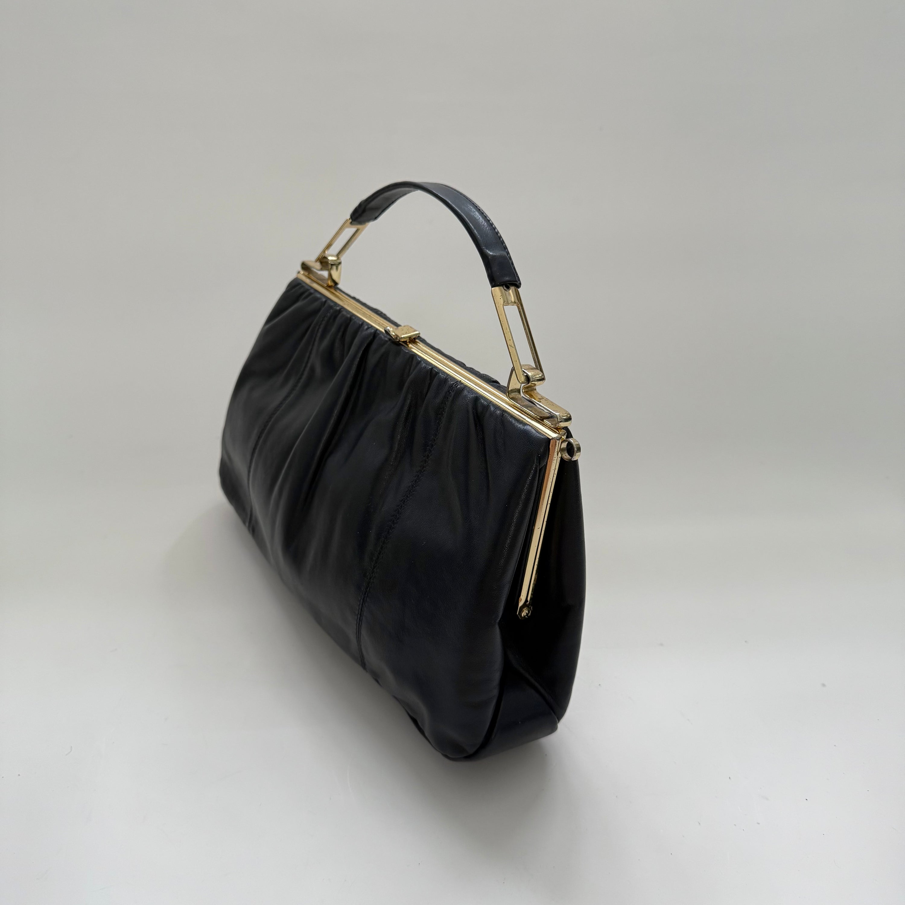 Vintage 70s Faigen Navy Leather Purse with Unique Sculptural Gold toned Top Handle