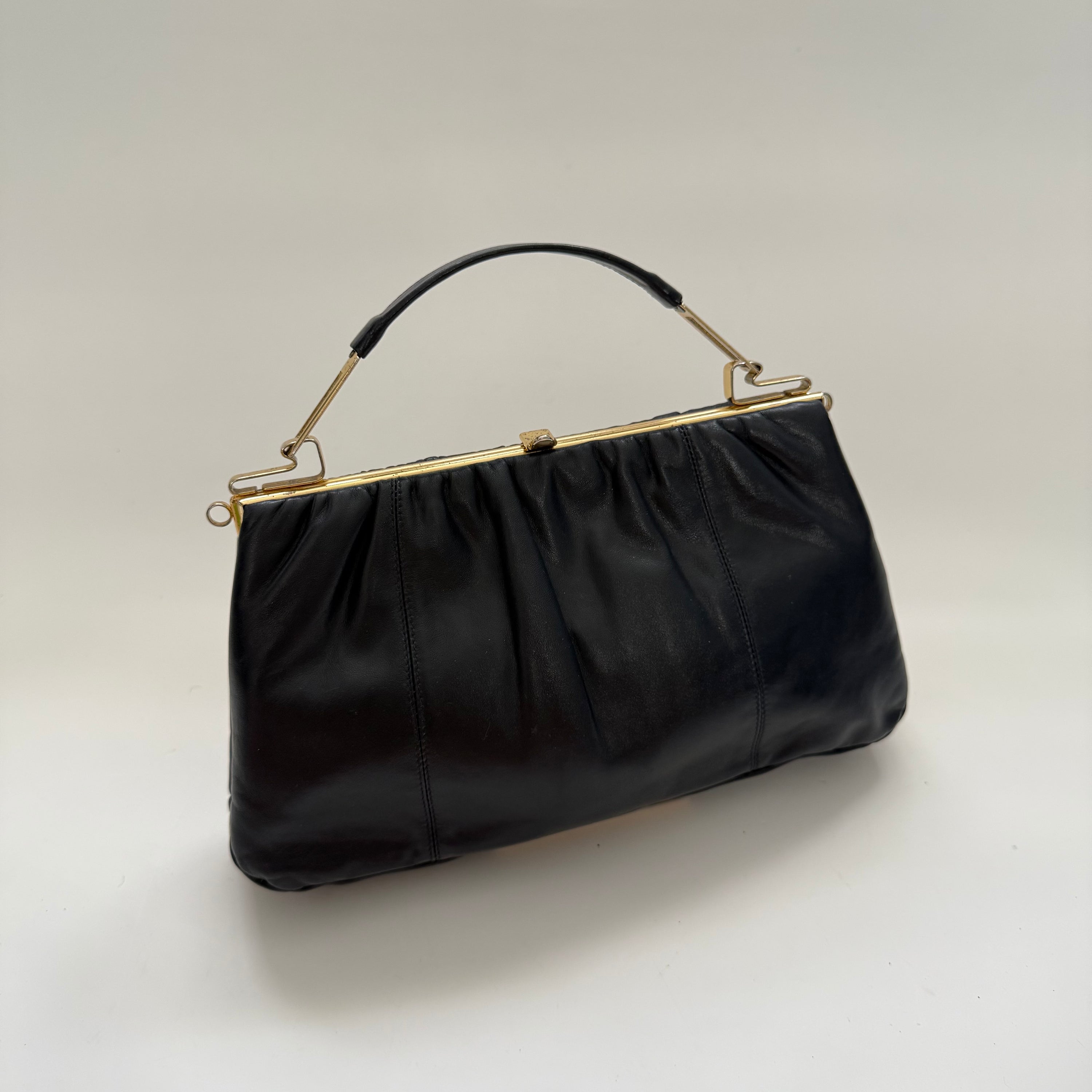 Vintage 70s Faigen Navy Leather Purse with Unique Sculptural Gold toned Top Handle